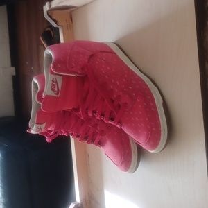 hot pink Nike with a little bit of a wedge  heel
